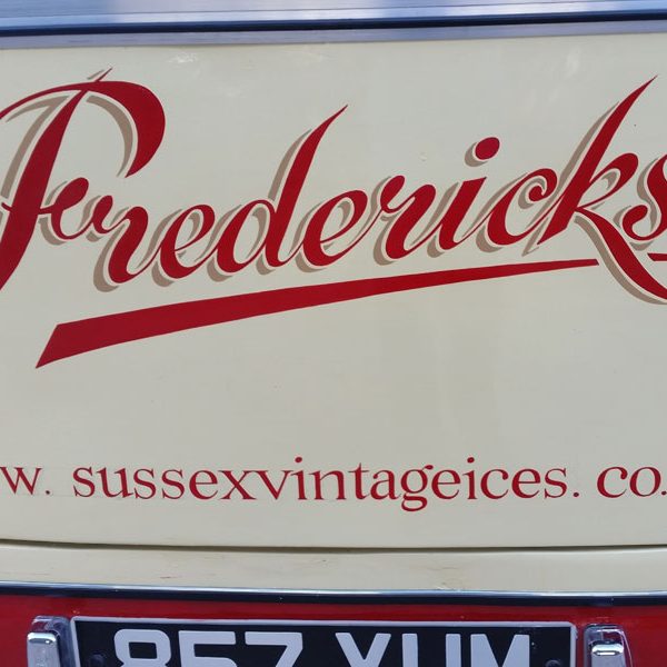 Handwritten signage for Sussex Vintage Ices ice cream van